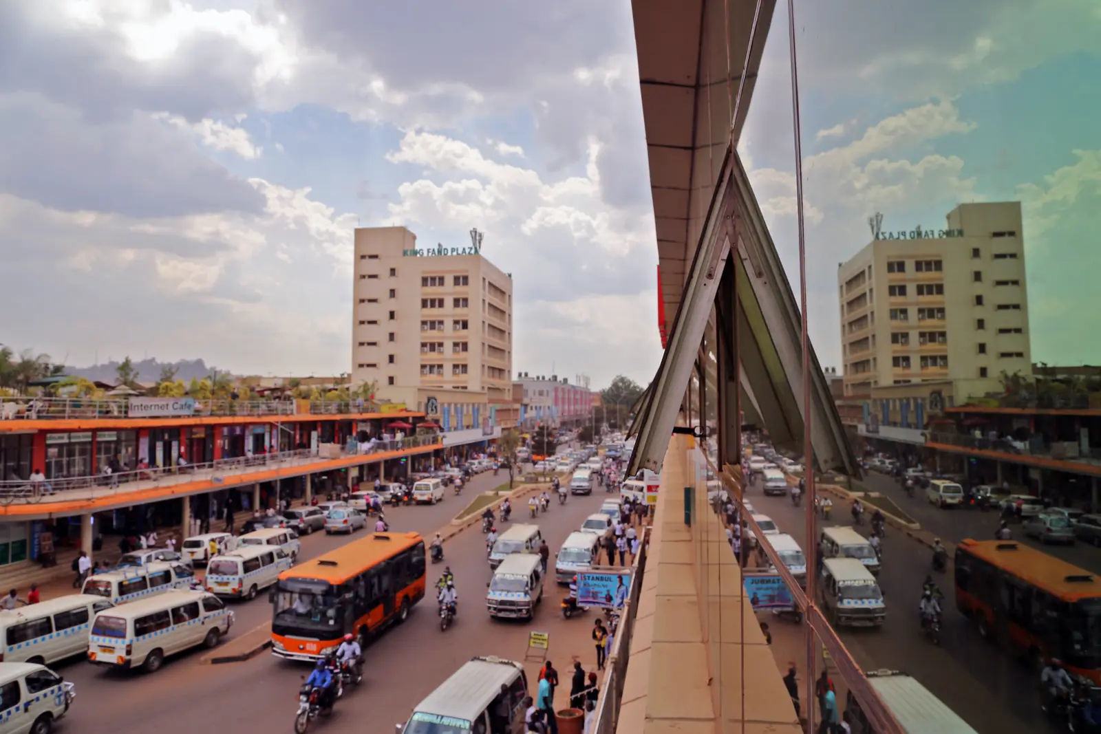 Minibus taxis, buses and cars on Kampala Road in central Kampala, Uganda
